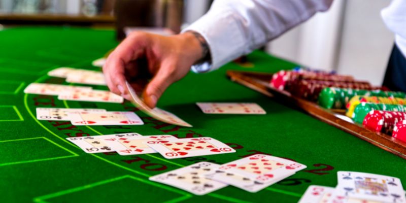 live casino dealer handing out cards