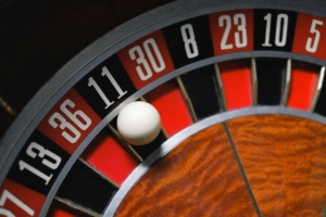 Landed ball in number 11 slot of roulette wheel