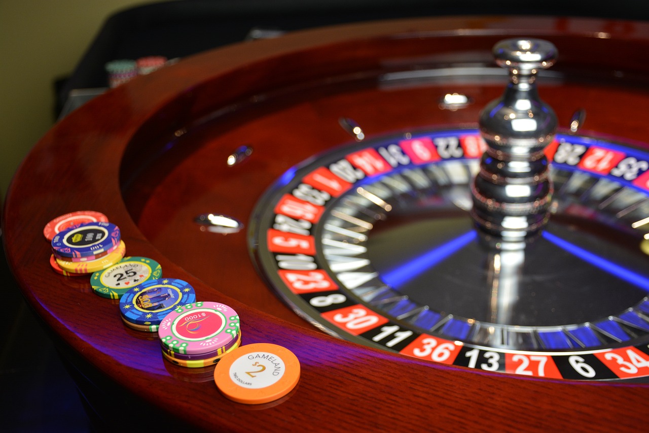 roulette wheel with casino chips placed on the edges