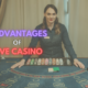 advantages of live casino text with female dealer in black at casino table